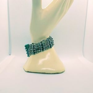 Silver and Peacock Blue-Green bracelet.